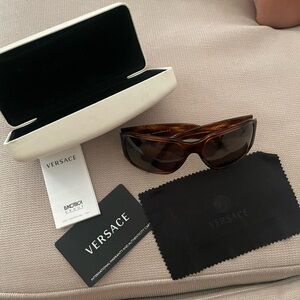 Versace sunglasses with dust cloth, and case